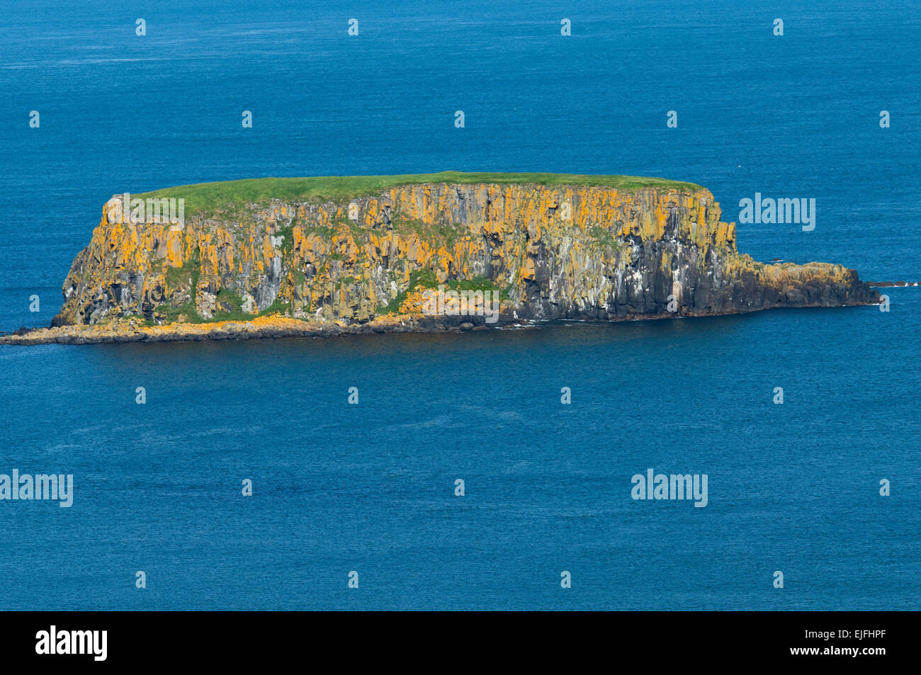 Uninhabited offshore island off the Antrim Coast, Northern Ireland Stock Photo