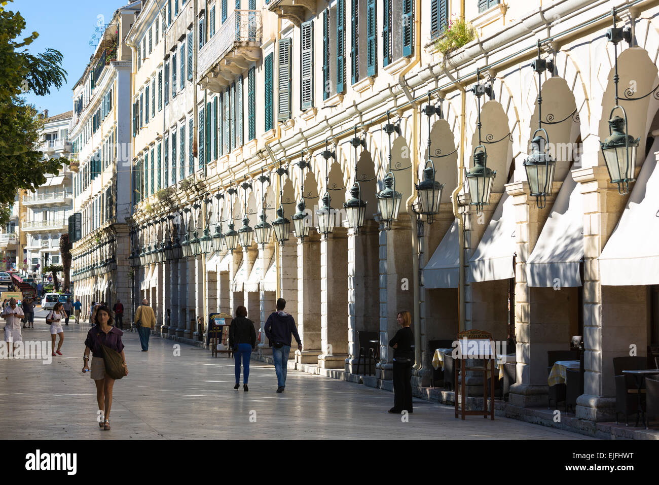 People strolling along the arcades of the Liston at the Spianada in Kerkyra, Corfu Town, Greece Stock Photo