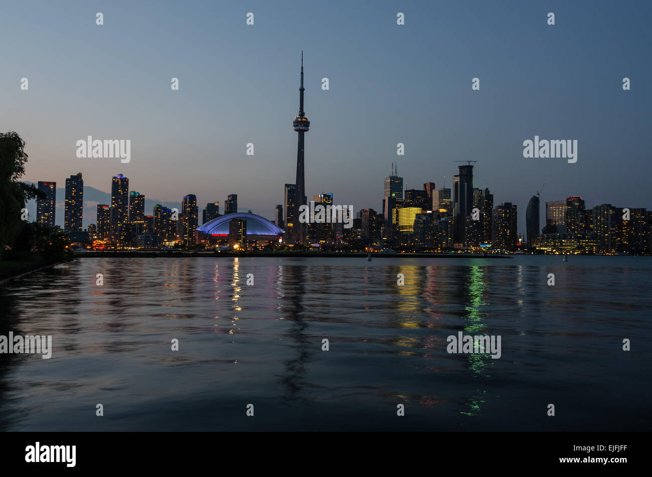 Skyline of Toronto over Ontario Lake after sunset Stock Photo - Alamy