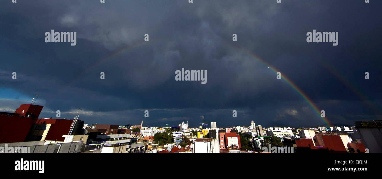 Mexico City, Mexico. 25th Mar, 2015. Two rainbows appear simultaneously