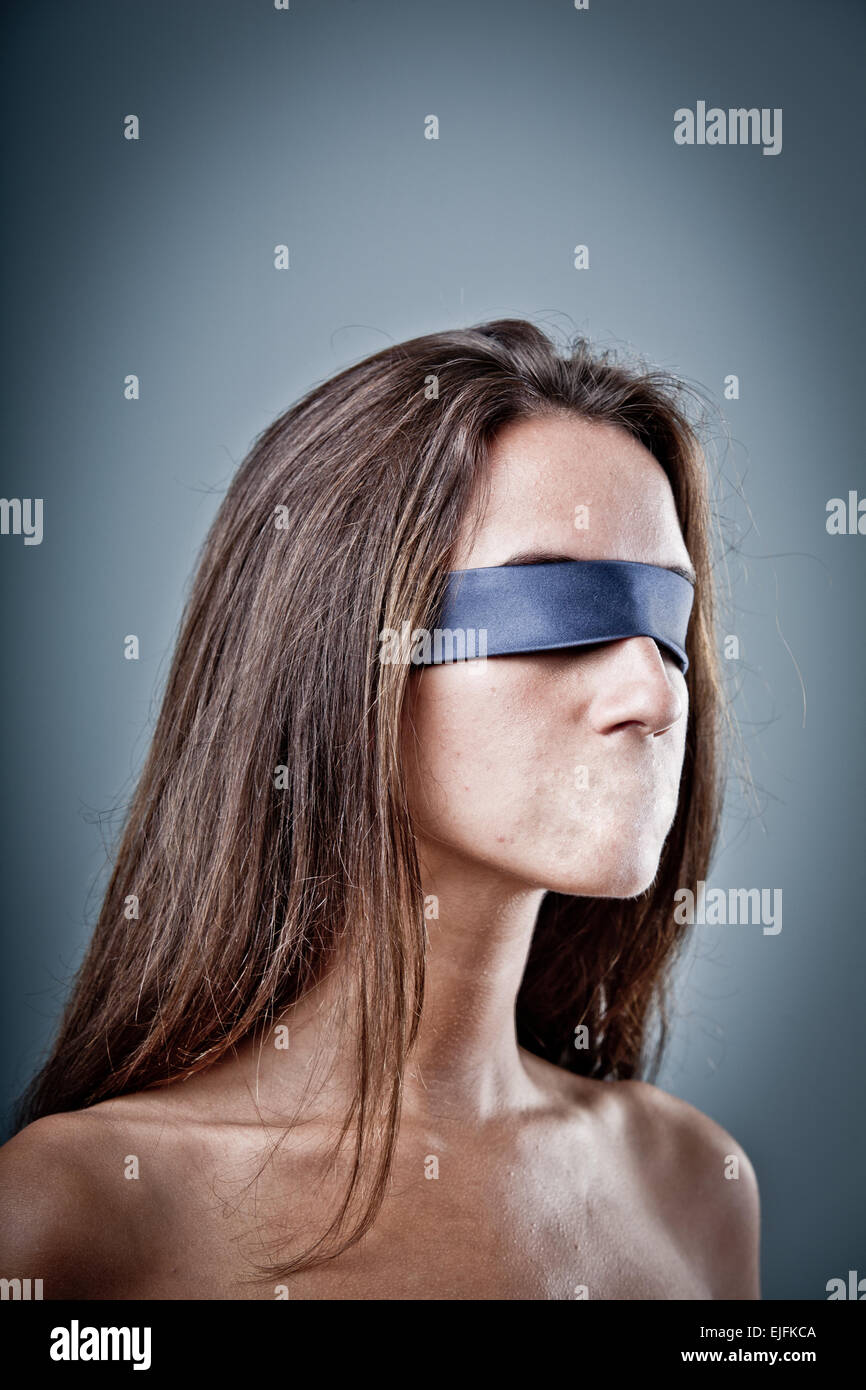 Young blindfolded woman Stock Photo by ©VGeorgiev 100898414