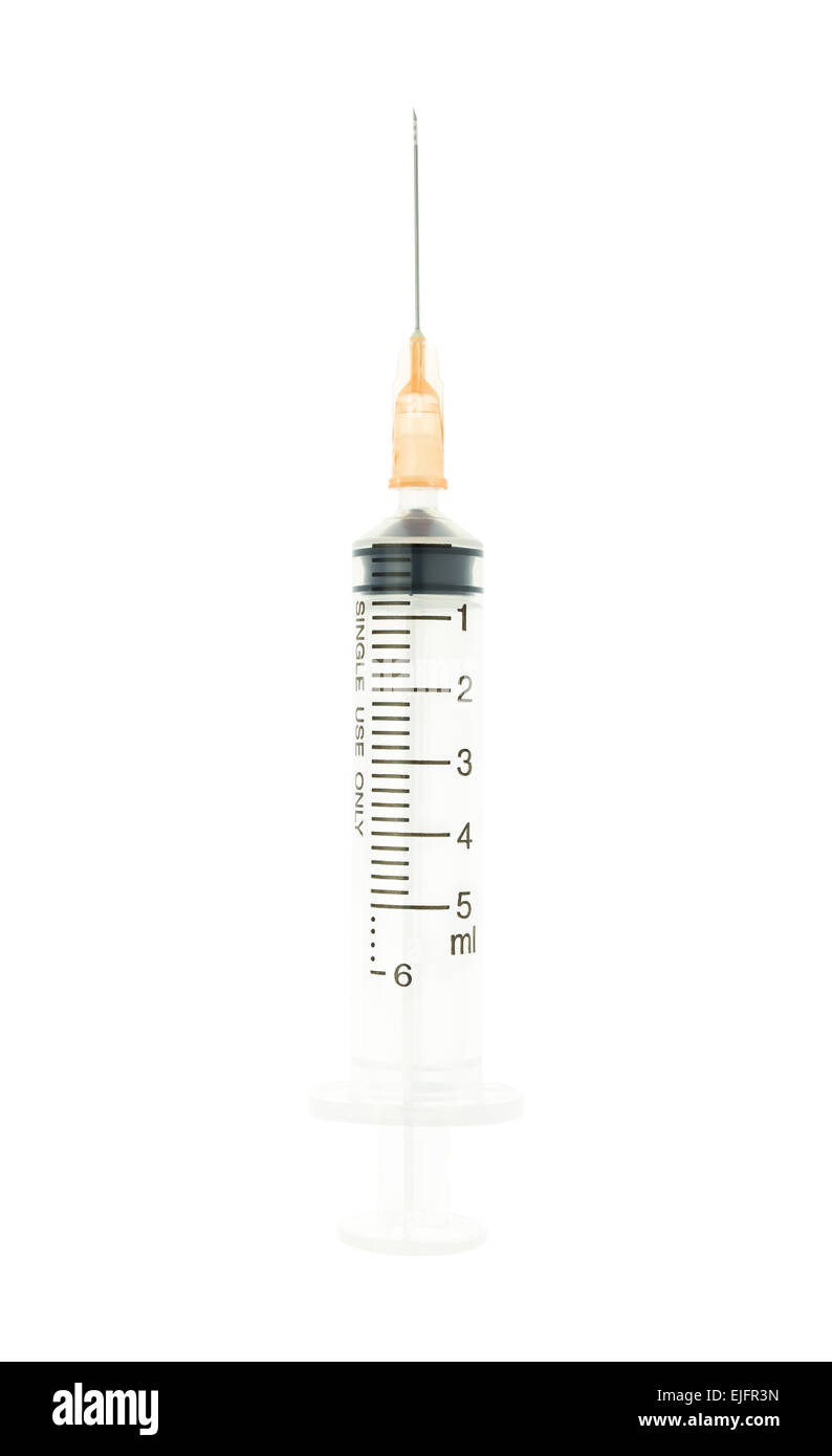 Plastic orange syringe isolated on white background on vertical view