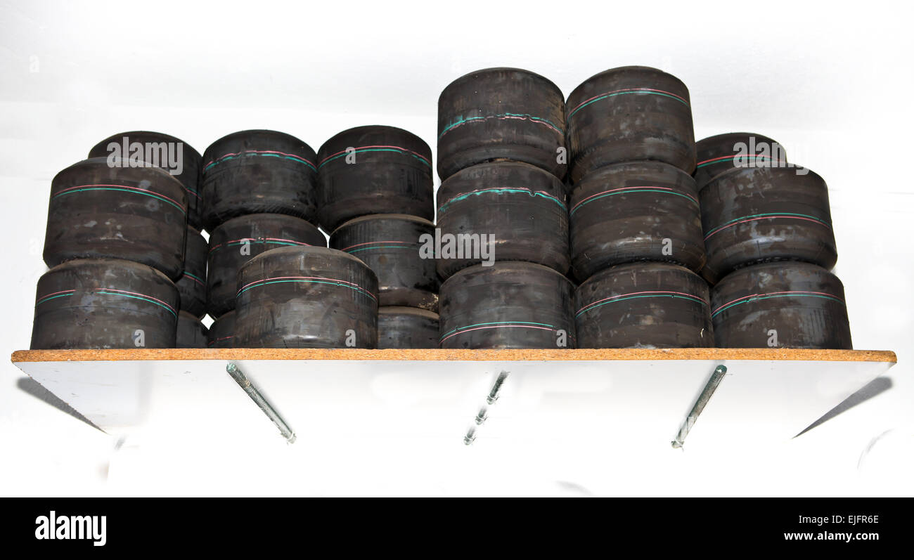 Loads of Karts wheels and tires after competition. Karting circuit workshop Stock Photo