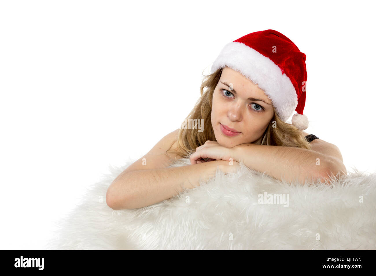 Portrait of joyful pretty woman in red santa claus hat isolated on ...