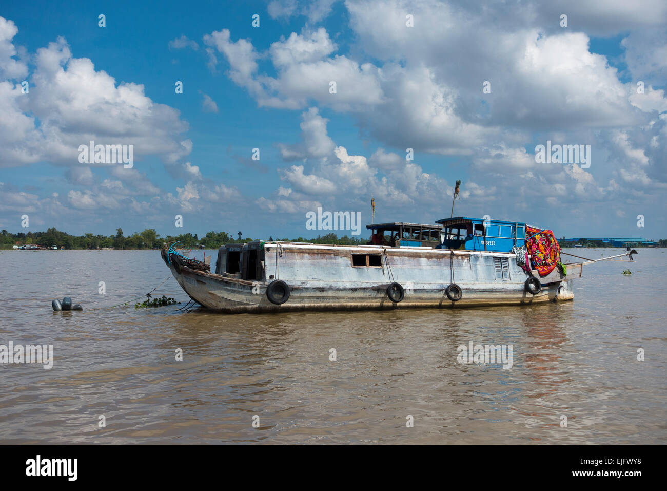 Transport ship on the Mekong River, Mekong Delta, Vietnam Asia Stock Photo