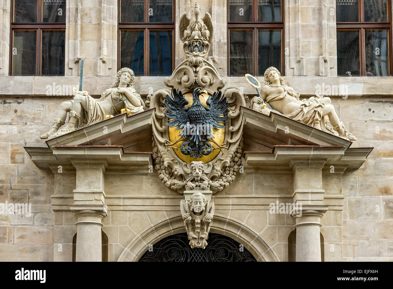 Crest with eagle and allegorical figures, Office of the Nuremberg Reichsschultheiß or Imperial mayor, Old City Hall Stock Photo