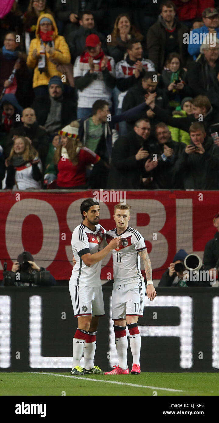 Kaiserslautern, Germany. 25th Mar, 2015. Germany's Marco Reus (R) and Sami Khedira cheer after scoring the 1-0 goal during the international friendly Germany vs Australia in Kaiserslautern, Germany, 25 March 2015. Photo: Thomas Frey/dpa/Alamy Live News Stock Photo