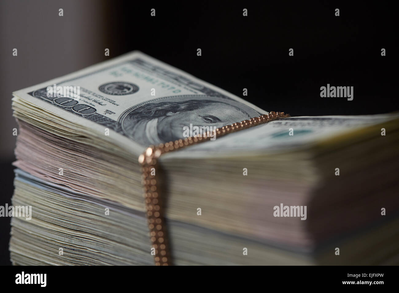 Gold dollar chain hi-res stock photography and images - Alamy