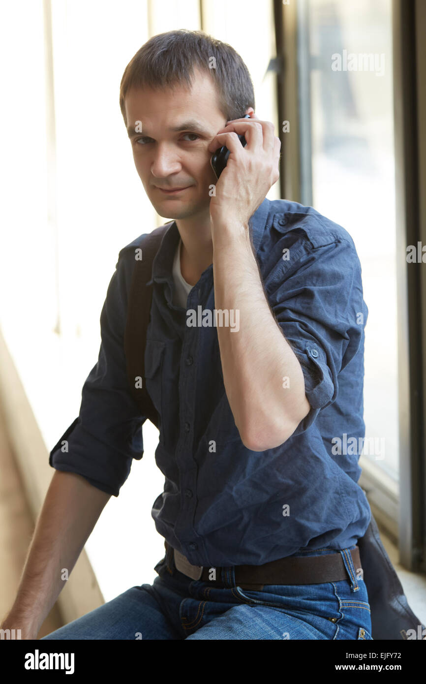 Businessman talking on a mobile phone Stock Photo Alamy