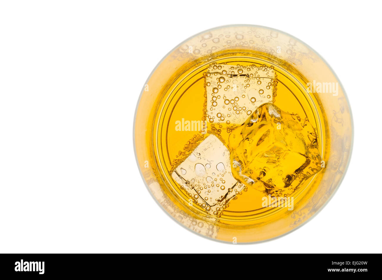 Glass of yellow drink with ice  top view with clipping path Stock Photo