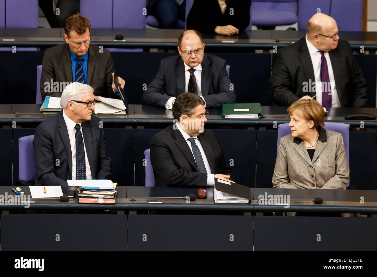 Berlin, Germany. 26th March, 2015. 97th Session of the German Bundestag -Consultation of the Federal German Government to the association agreements between the European Union,  the Ukraine, Georgia and the republic Moldavia, at Bundestag on March 26, 2015 in Berlin Germany. /Picture: Frank-Walter Steinmeier (SPD), German Foreign Minister, Sigmar Gabriel (SPD), German Minister of Economy and Energy, and German Chancellor Angela Merkel. Credit:  Reynaldo Chaib Paganelli/Alamy Live News Stock Photo