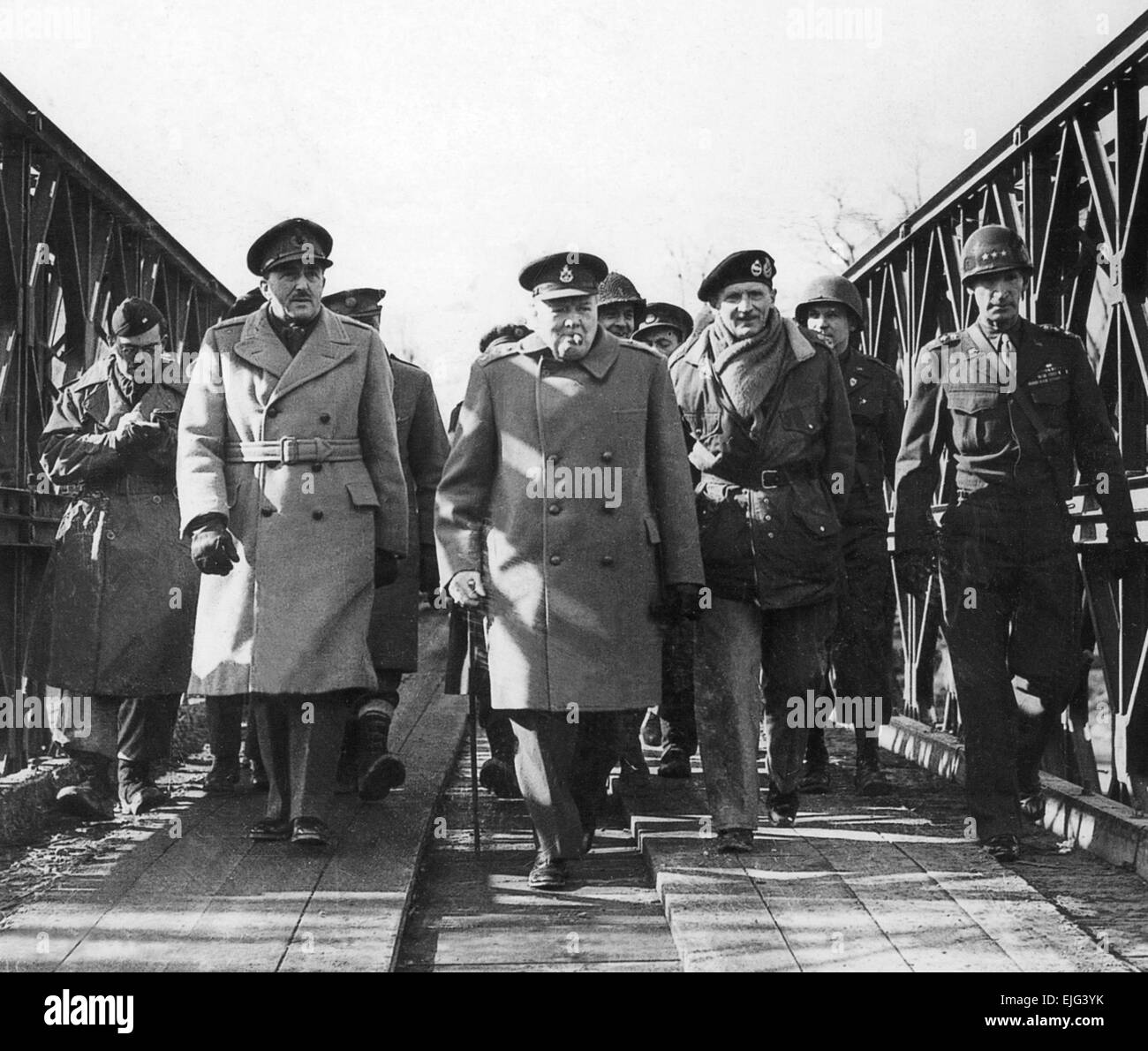 ALLIED COMMANDERS CROSSING RHINE  26 March 1945. From left Field Marshal Sir Alan Brooke, Winston Churchill, Field Marshal Bernard Montgomery, US Lieutenant-General William Simpson cross the Rhine on a Bailey Bridge Stock Photo