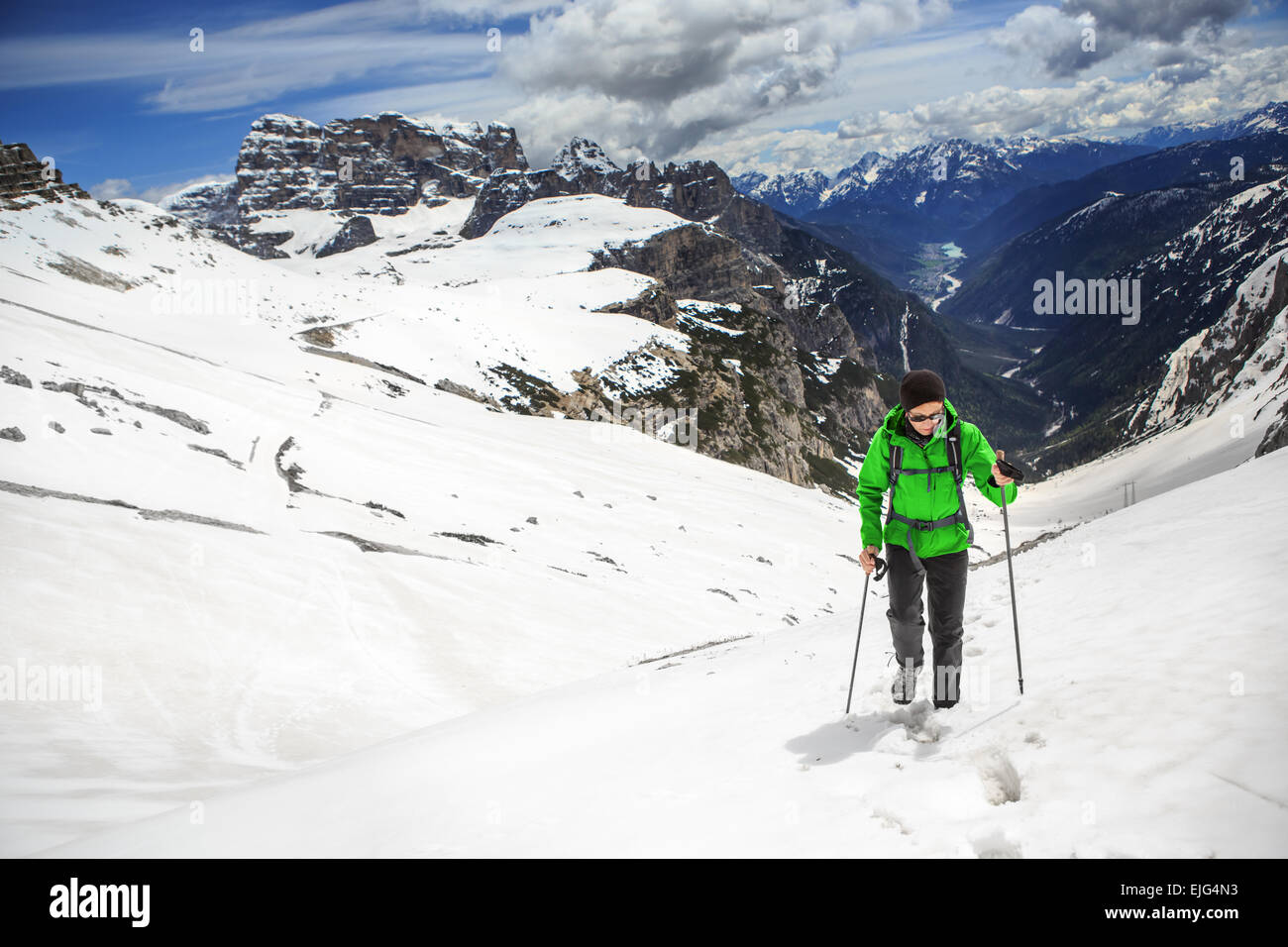 A woman hiking in Drei Zinnen alias Tre Cime area in South Tirol, Italy Stock Photo
