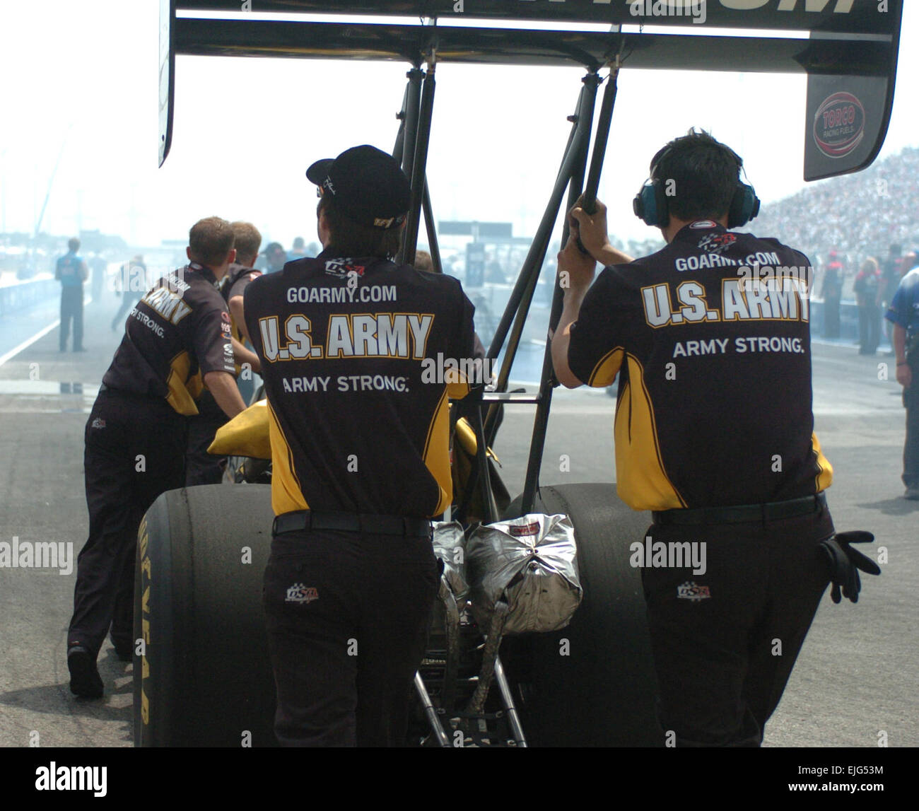 Army Top Fuel Team members push the "The Sarge's" dragster into