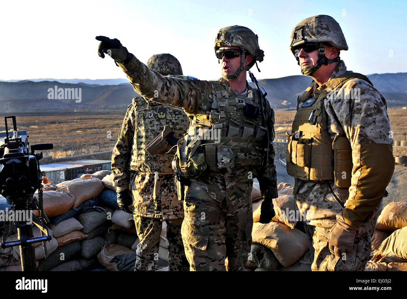 A Soldier briefs U.S. Marine Corps Gen. John R. Allen, commander of the ...