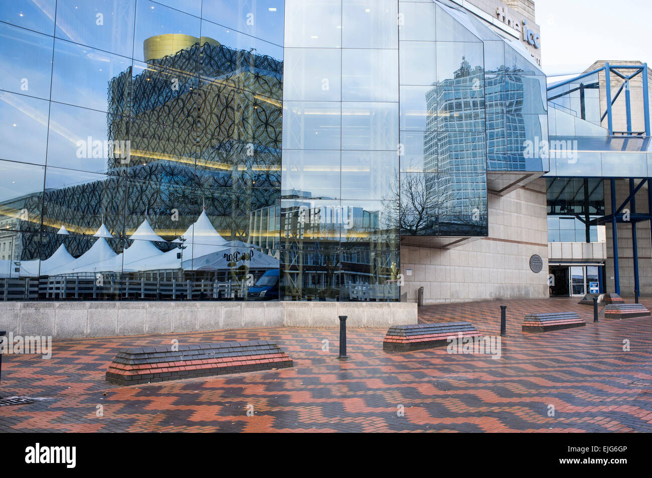 Library of Birmingham reflection in windows of ICC, Birmingham Stock