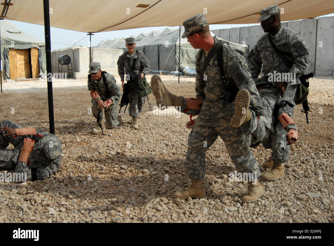 Sgt. 1st Class Shane Palmer and U.S. Army Staff Sgt. Ayinla Aromire ...