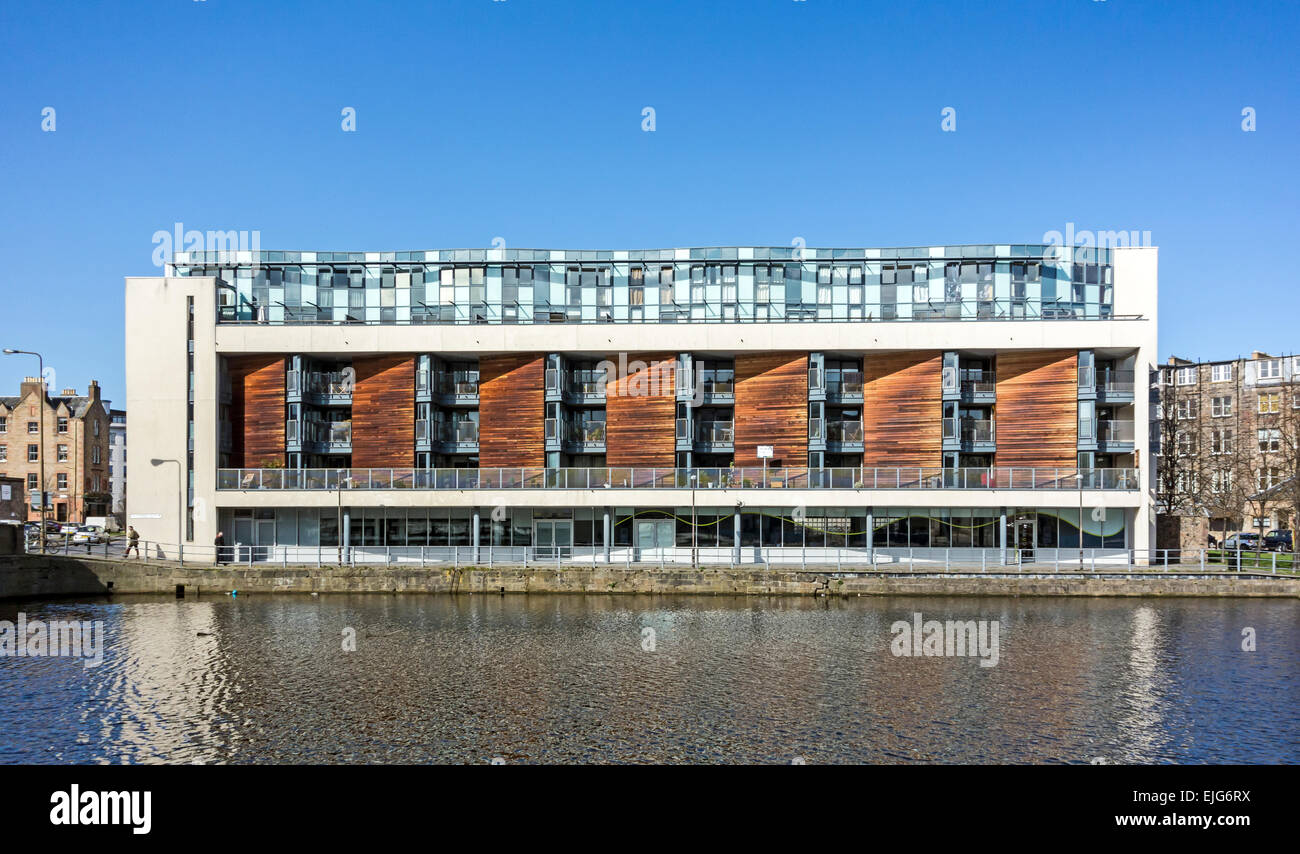 Waterside apartments on Ronaldson's Wharf by Water of Leith in Leith