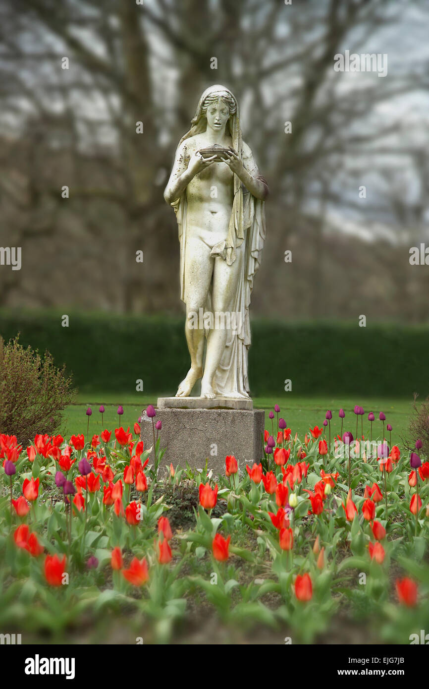torosay castle garden statue with tulips isle of mull Stock Photo