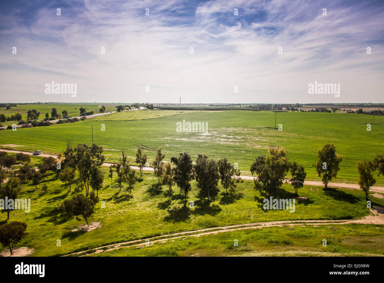 rural landscape, green field and blue sky Stock Photo - Alamy