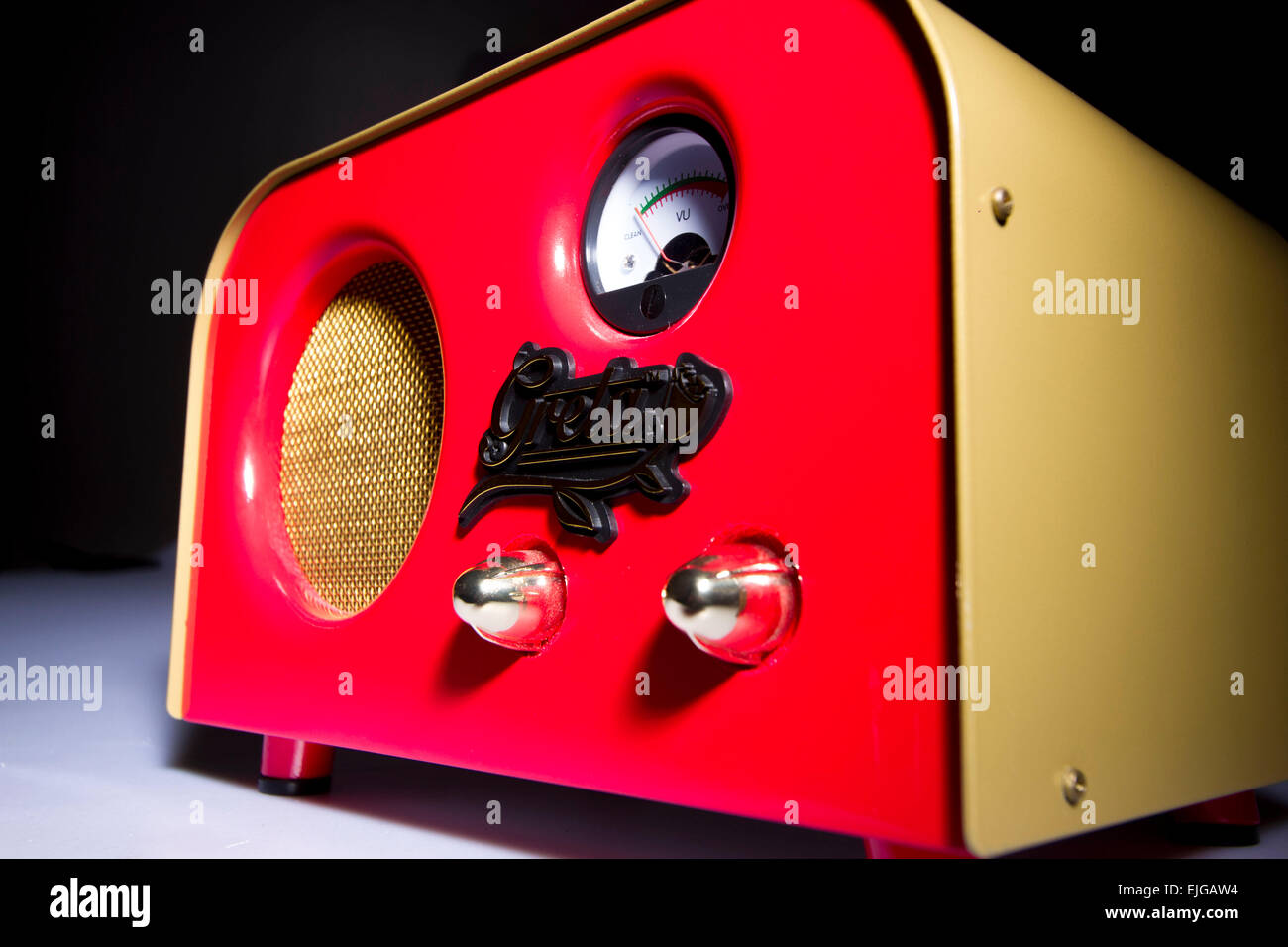 Red Guitar amplifier,amplificador de guitarra roja,vintage guitar, guitar, tails, retail, amplifier, audio, background, close up Stock Photo