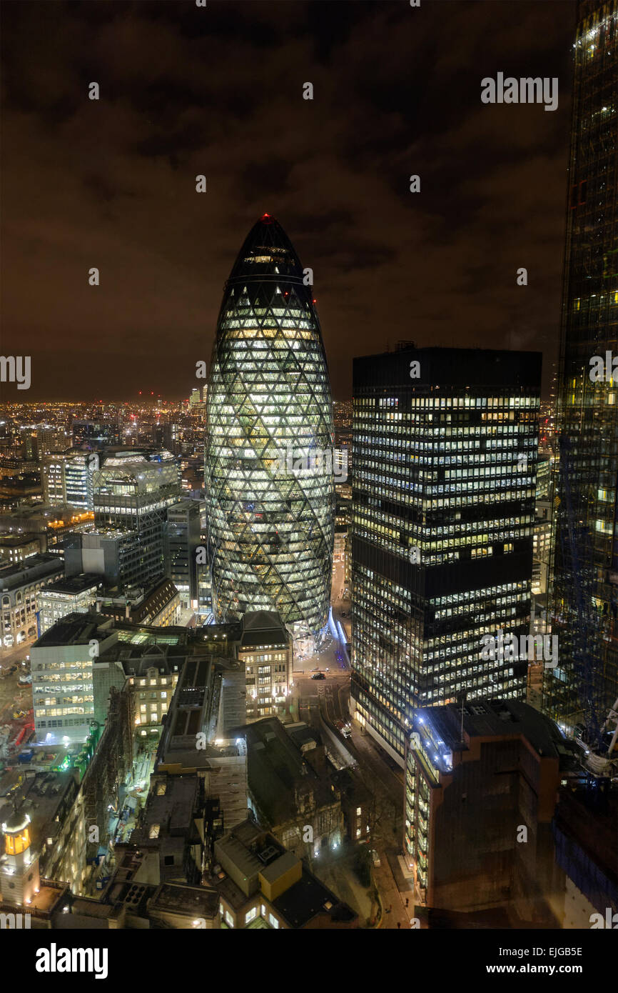 Landmark London skyscraper, The Gherkin at night Stock Photo