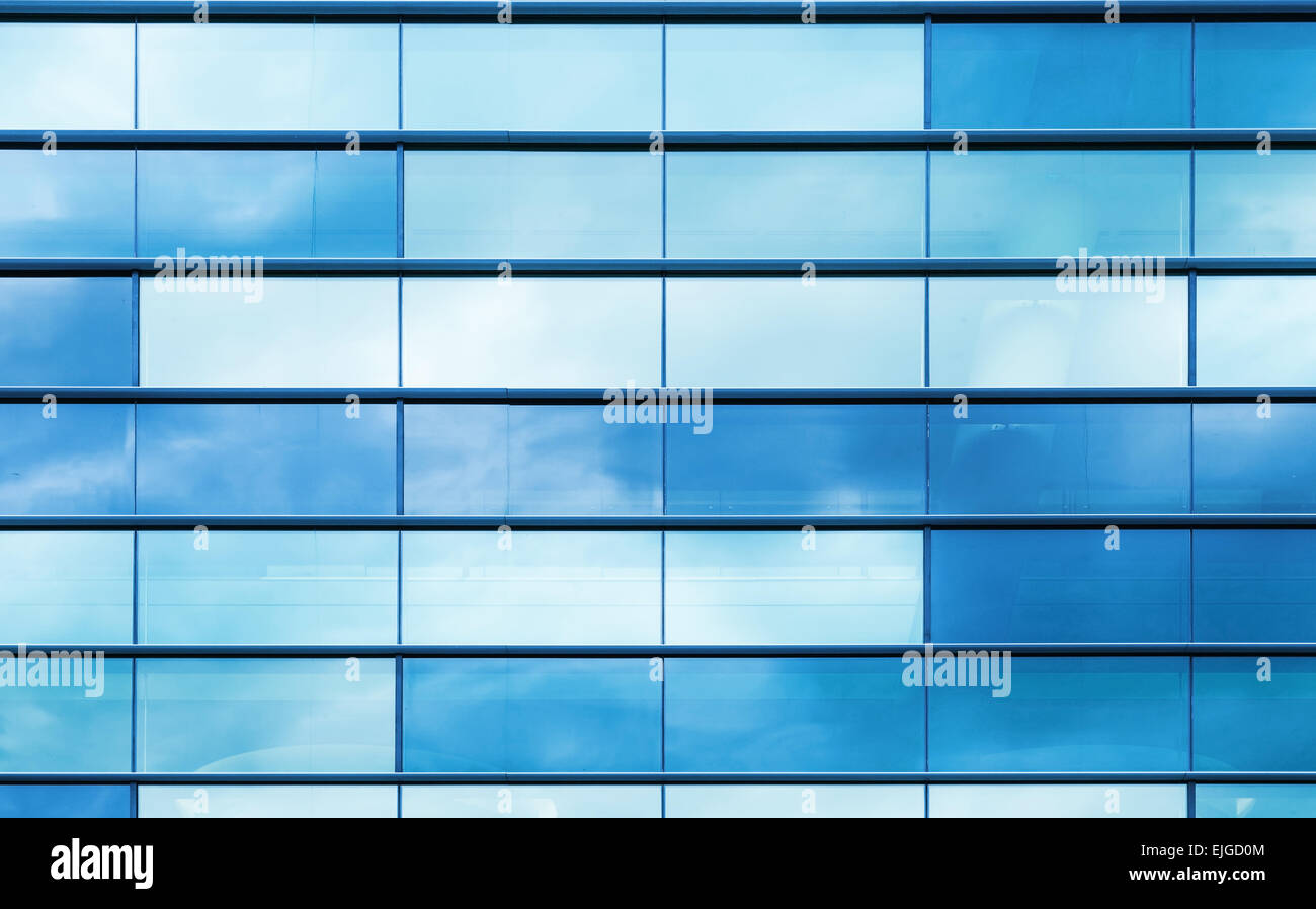 Modern office building wall made of blue glass and steel frame, background texture Stock Photo