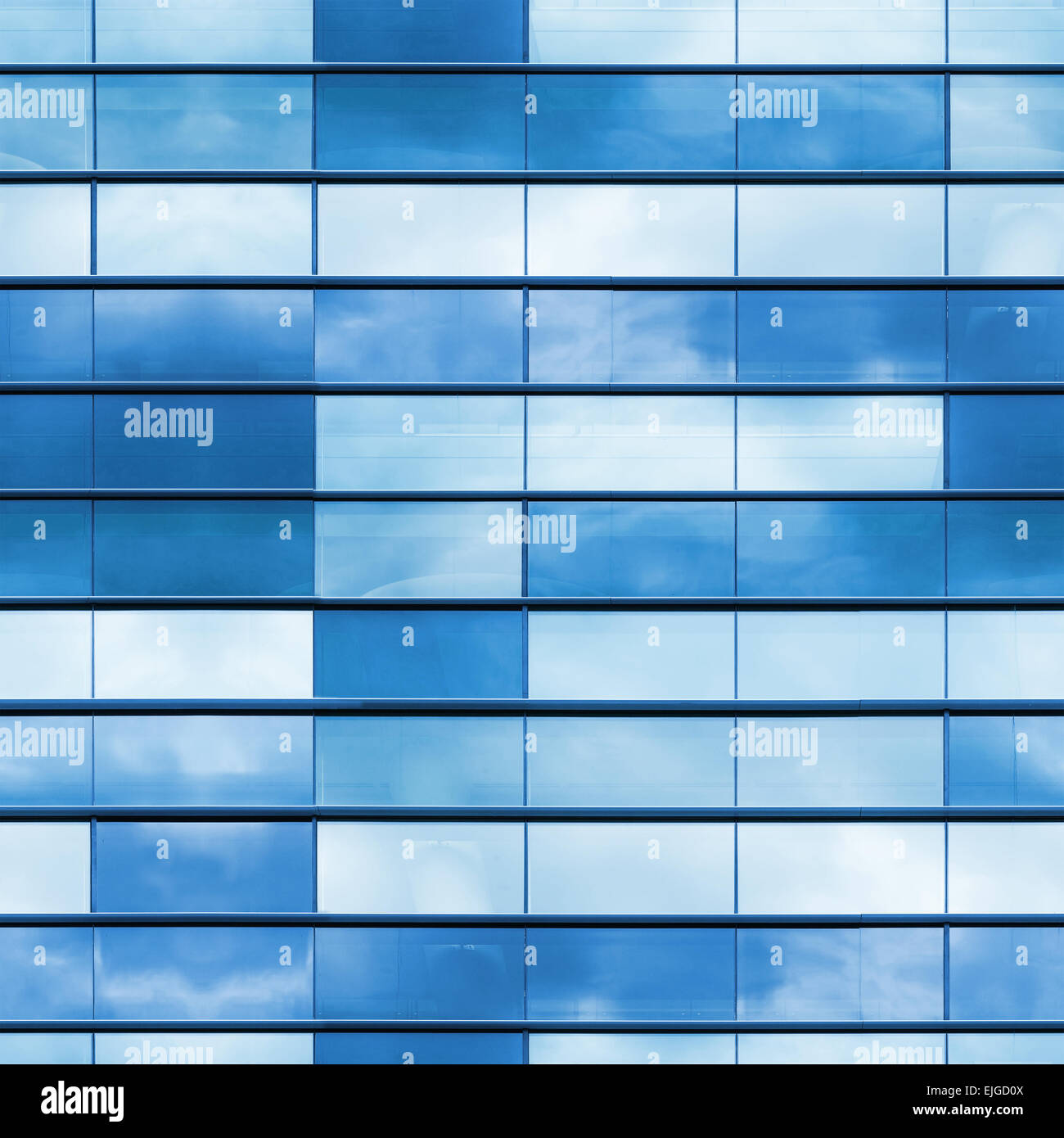 Modern office building wall made of blue glass and steel frame, square seamless photo texture Stock Photo