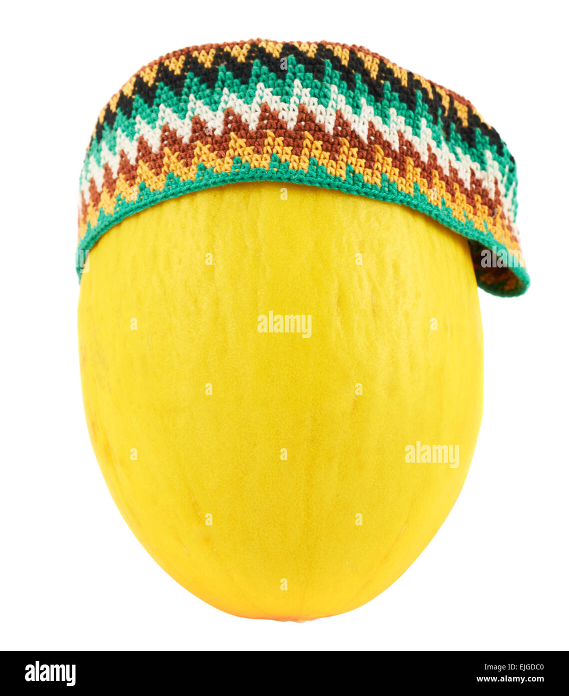 Colorful kofia hat over a melon Stock Photo