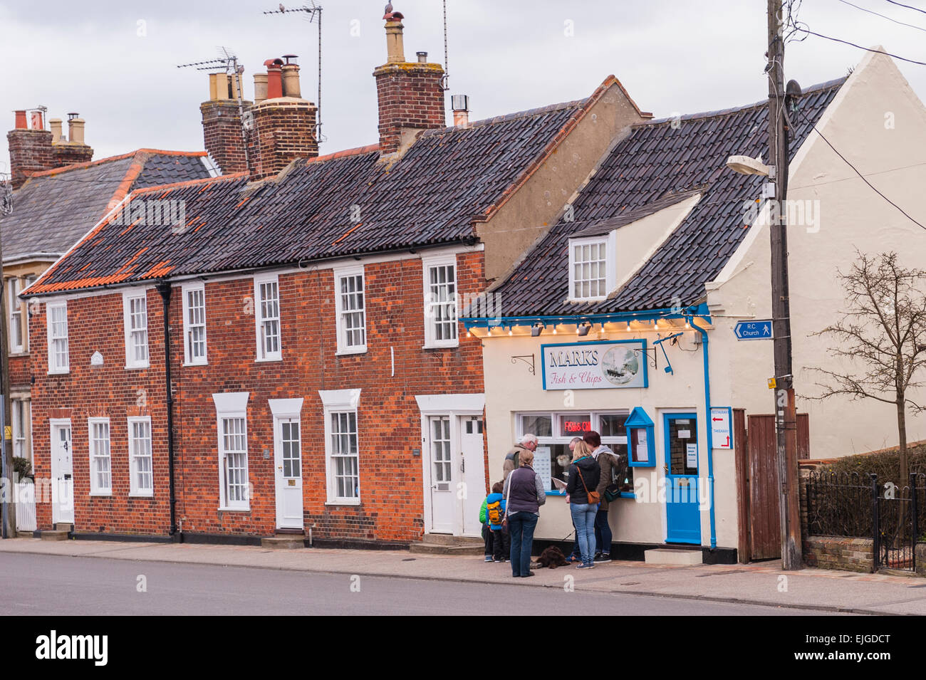 People outside the fish & chip shop in Southwold , Suffolk , England , Britain , Uk Stock Photo