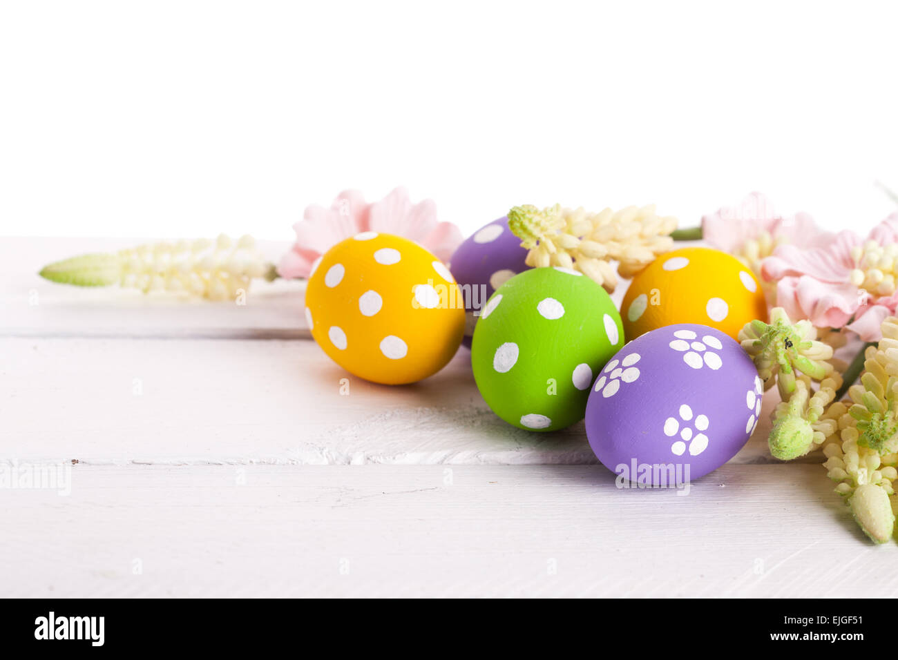 Easter Eggs with Spring Flowers Stock Photo