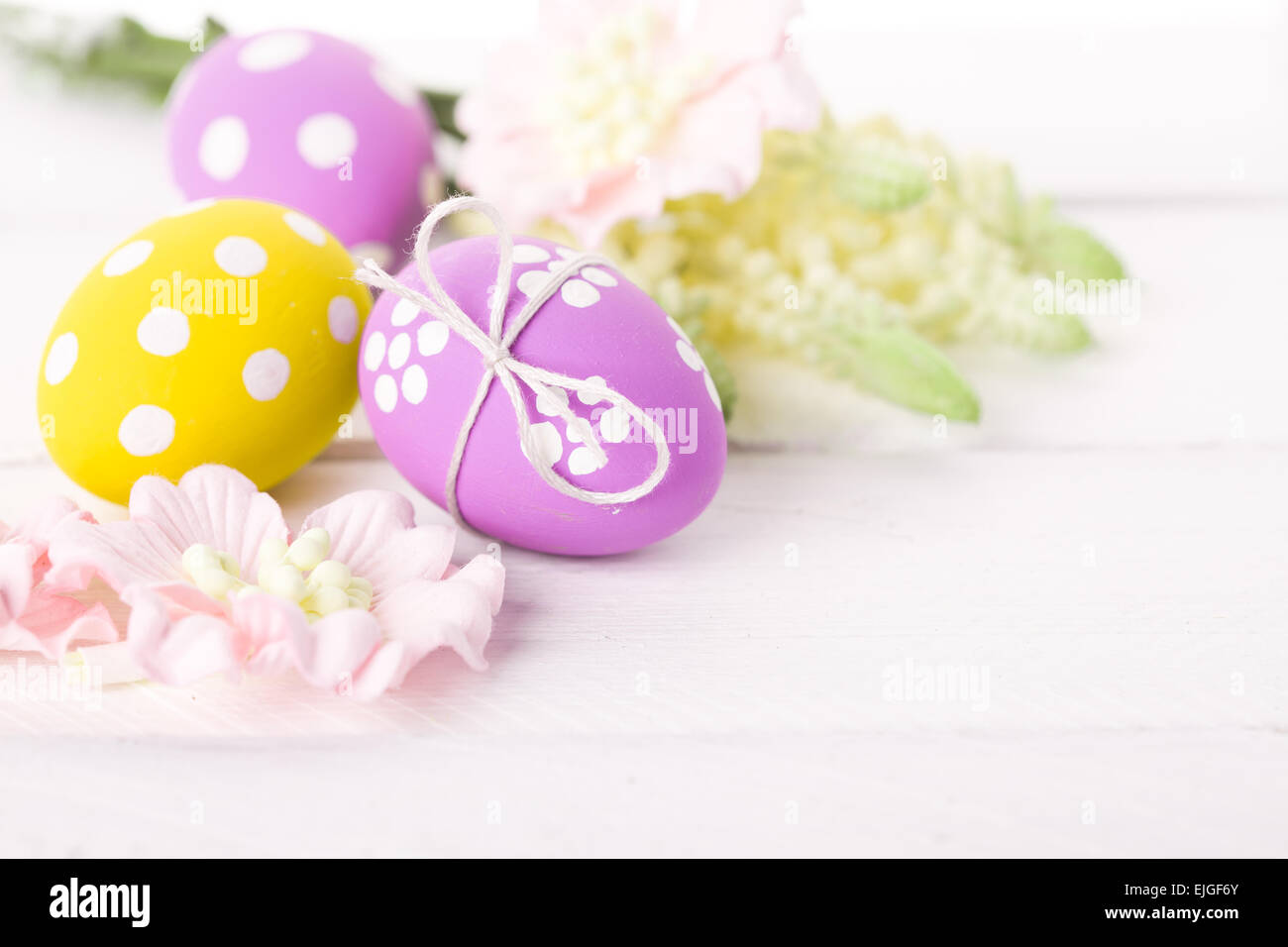 easter background with eggs and flowers Stock Photo - Alamy