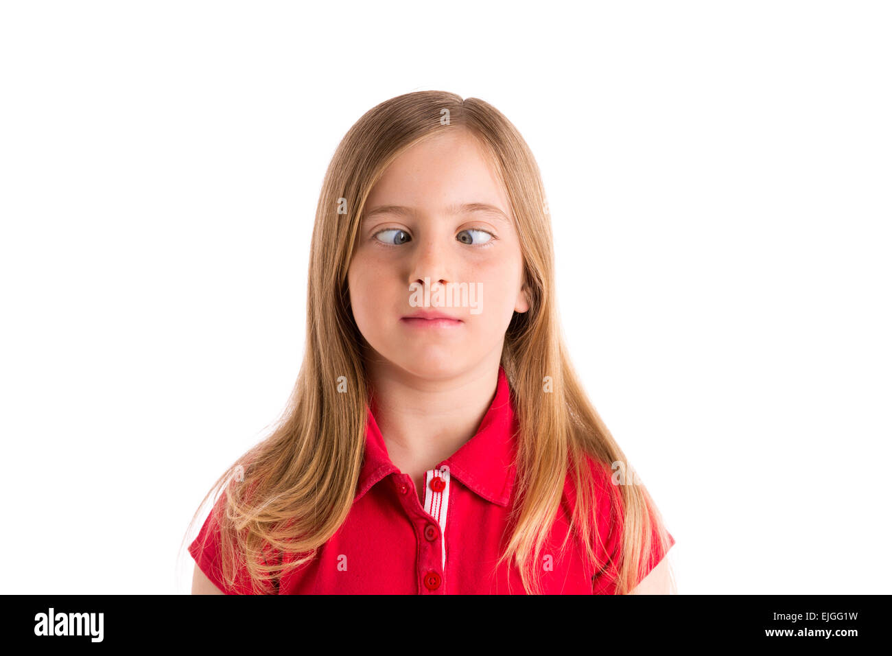 crossed eyes blond kid girl funny expression gesture in white background Stock Photo