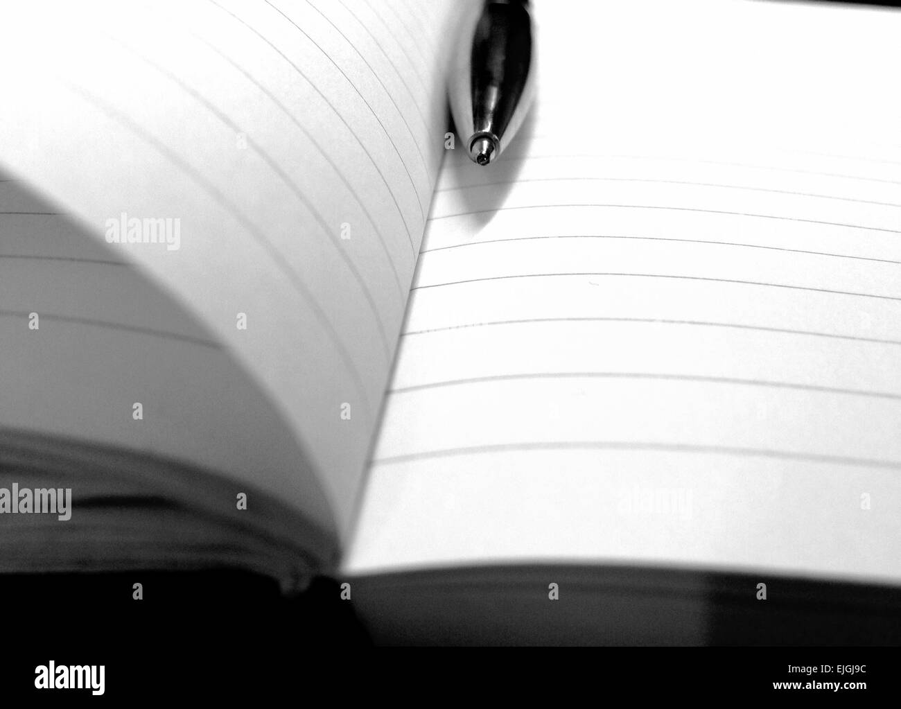 Pen on a notepad Stock Photo