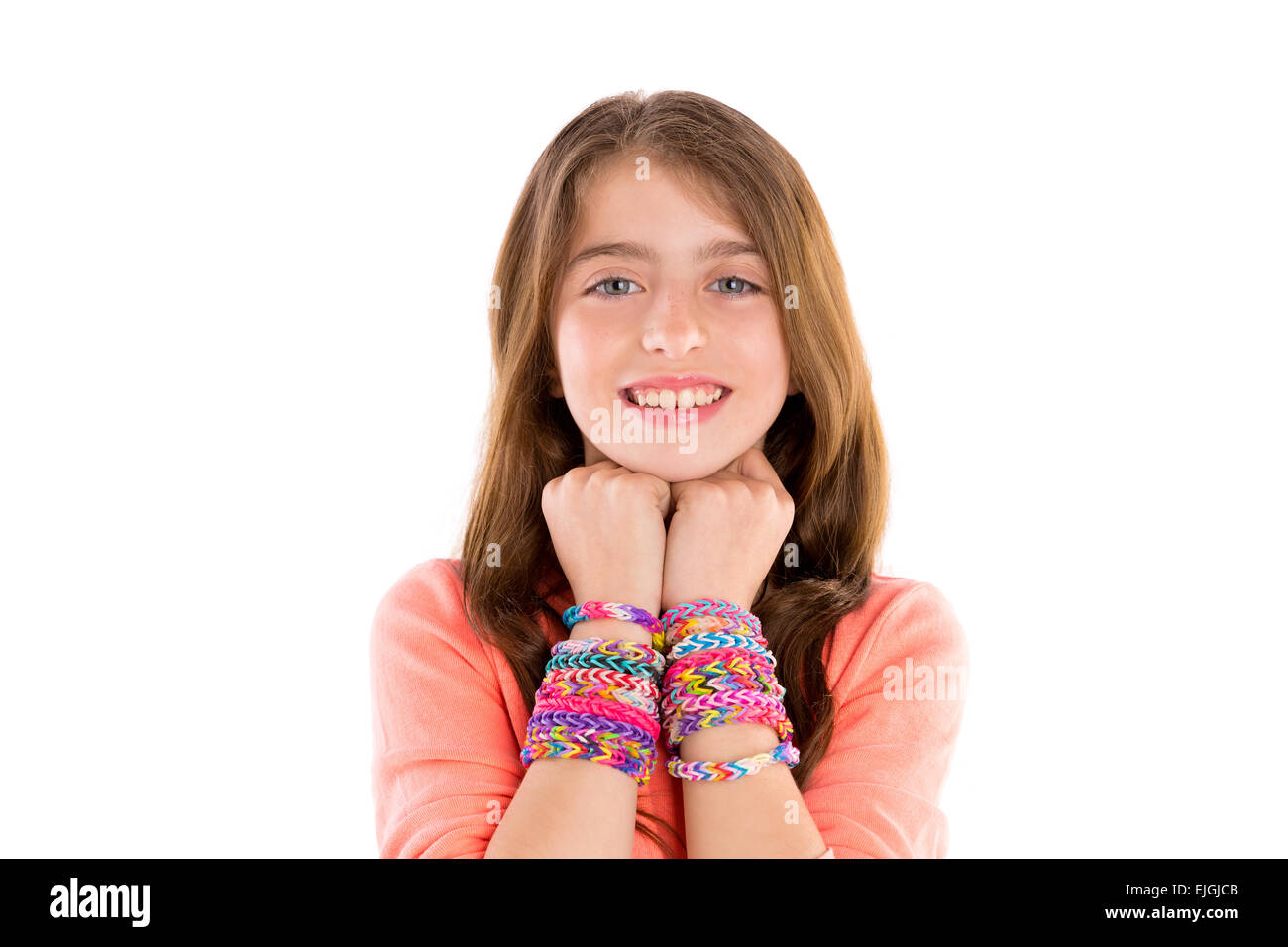Loom rubber bands bracelets blond kid girl smiling hands in neck on white background Stock Photo