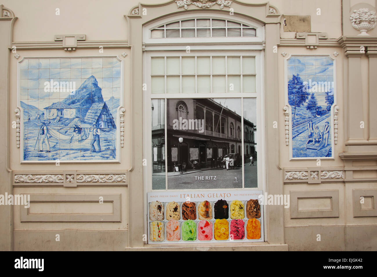 Wall tiles and a old photograph on the side wall of the Ritz restaurant in Funchal Madeira Portugal Stock Photo