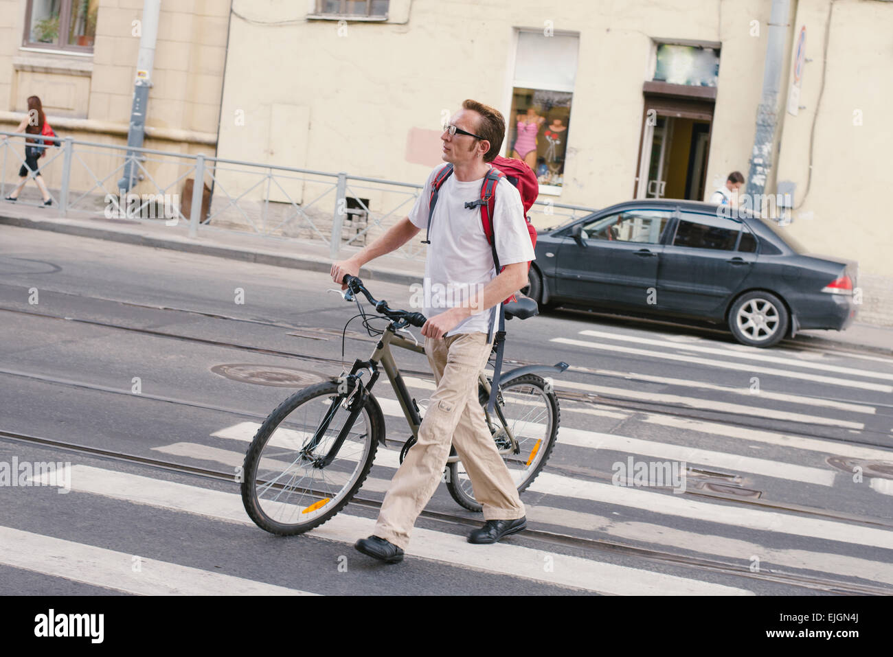 tourist crossing the crosswalk Stock Photo