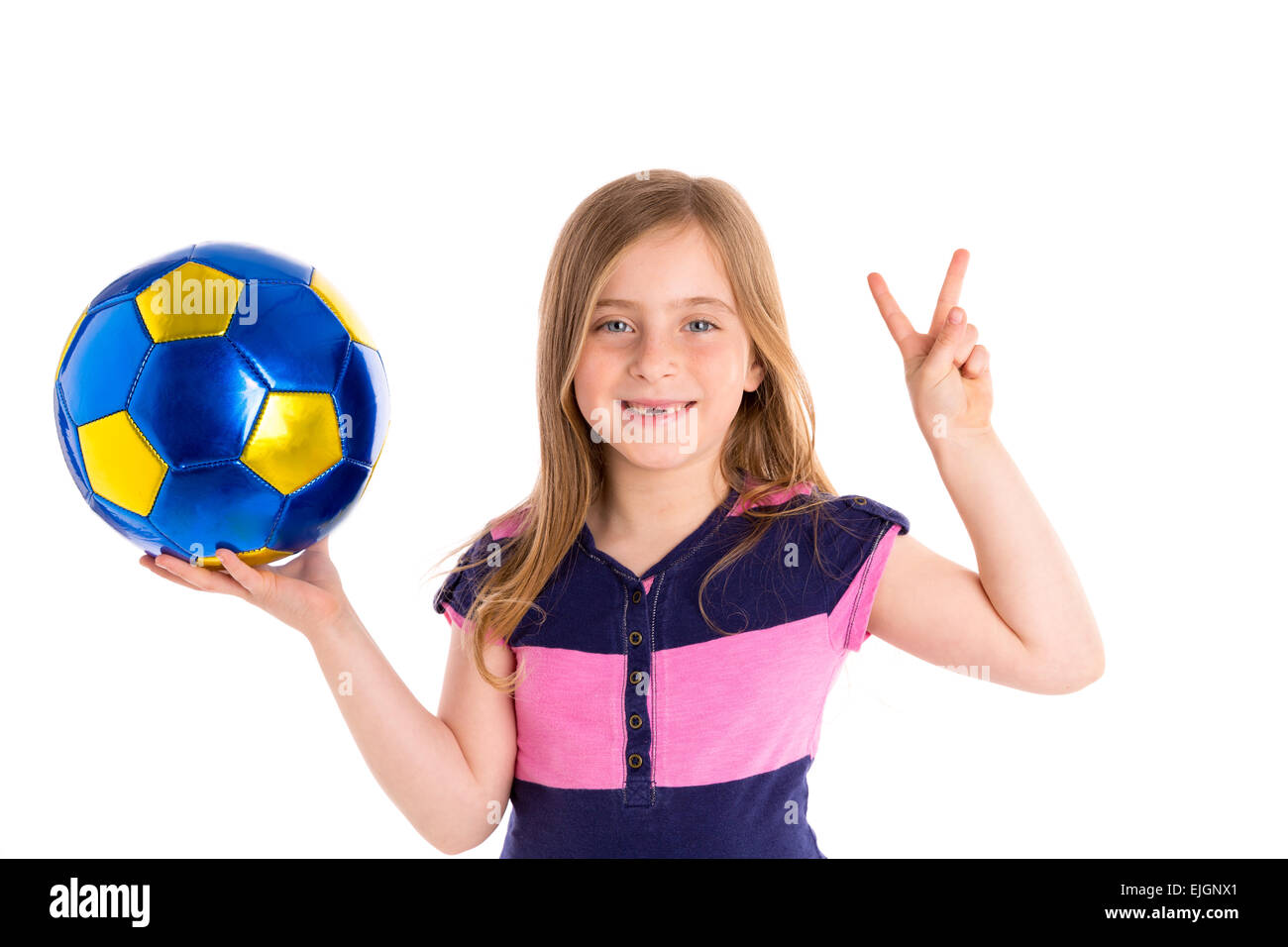 Football soccer blond kid girl happy player with ball on white background Stock Photo