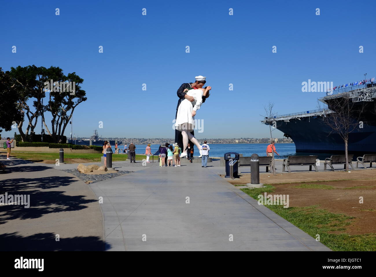 USS Midway on the waterfront in San Diego, and statue of Sailor Kissing