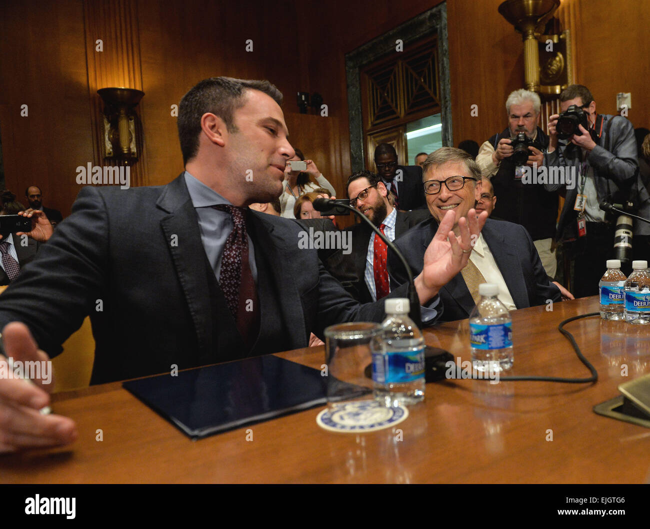 Washington, DC, USA. 26th Mar, 2015. Actor, filmmaker and founder of Eastern Congo Initiative Ben Affleck (L) talks with Bill & Melinda Gates Foundation Co-Chair Bill Gates before a hearing on Diplomacy, Development, and National Security, on Capitol Hill in Washington, DC, capital of the United States, March 26, 2015. Credit:  Bao Dandan/Xinhua/Alamy Live News Stock Photo