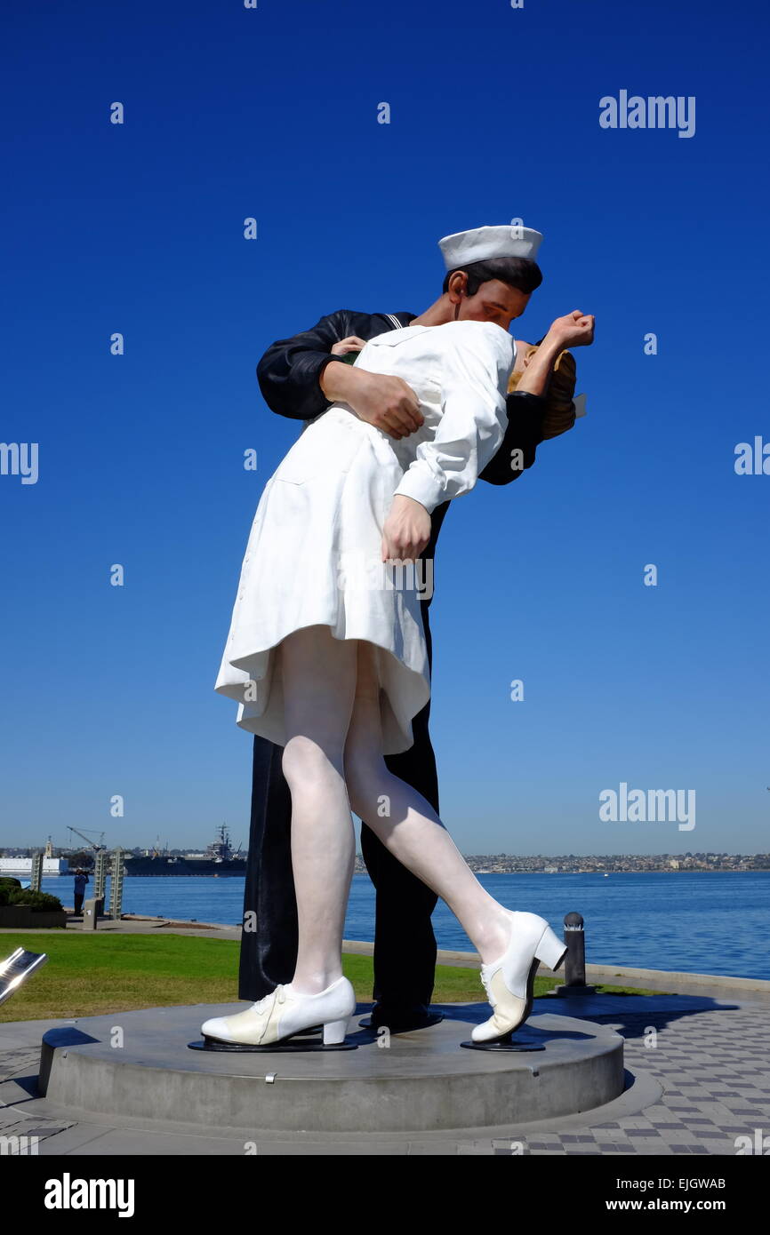 USS Midway on the waterfront in San Diego, and statue of Sailor Kissing Girl at the end of World