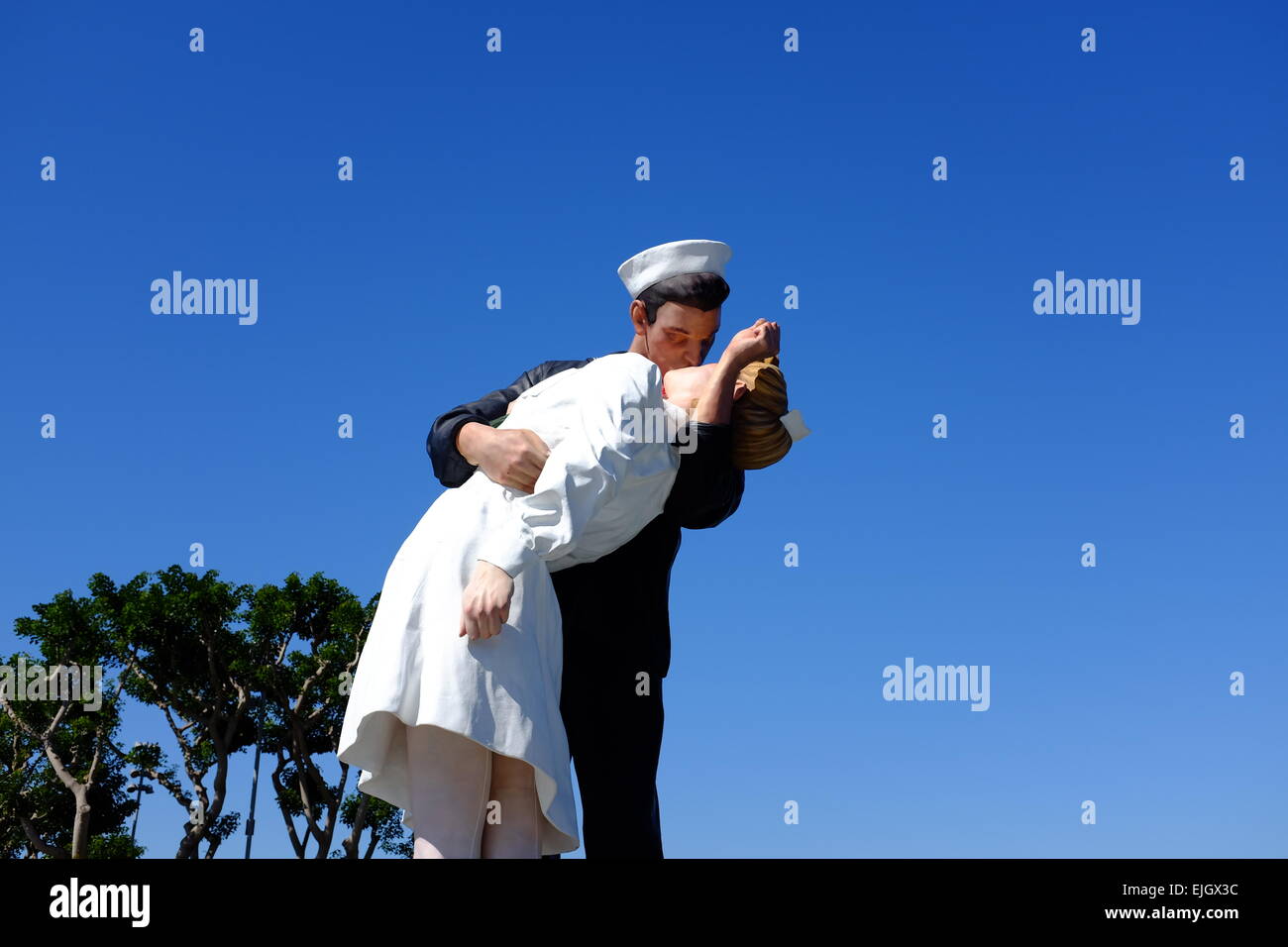 USS Midway on the waterfront in San Diego, and statue of Sailor Kissing