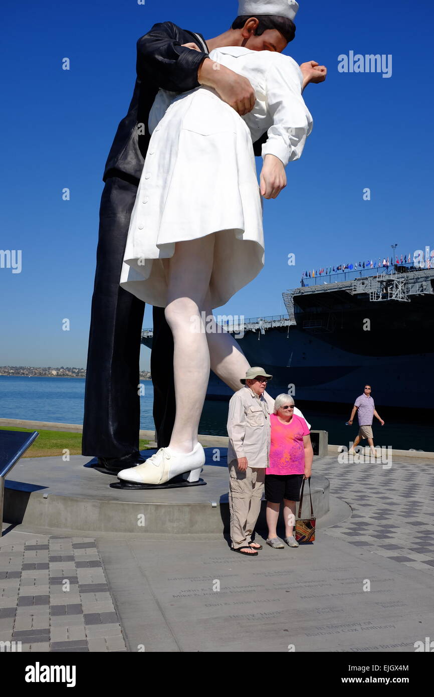 USS Midway on the waterfront in San Diego, and statue of Sailor Kissing