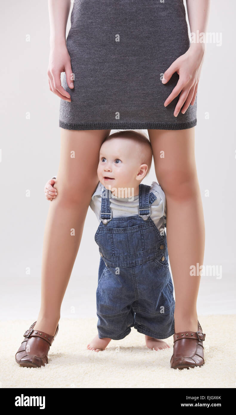 Baby between legs mom hires stock photography and images Alamy