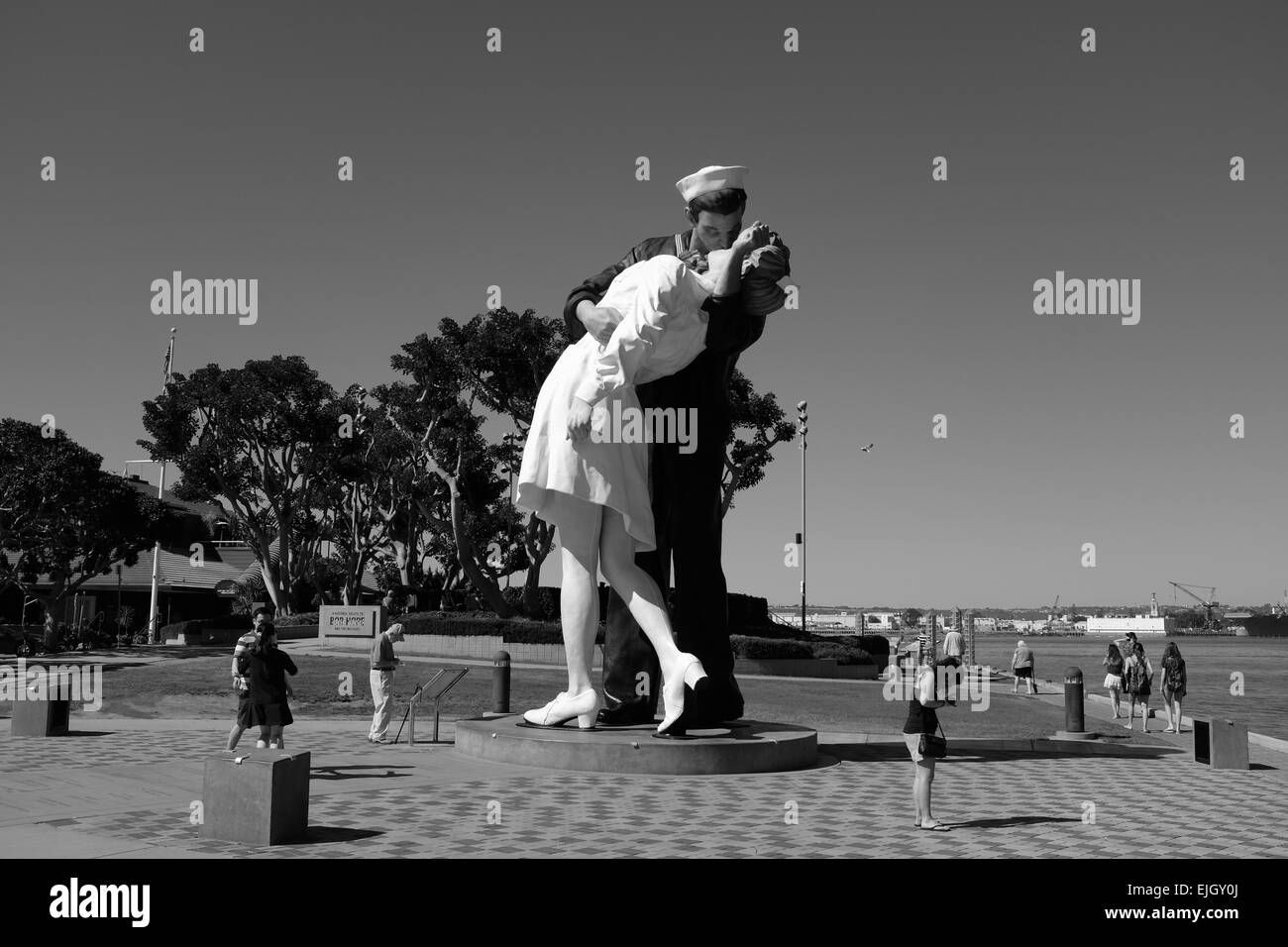 USS Midway on the waterfront in San Diego, and statue of Sailor Kissing