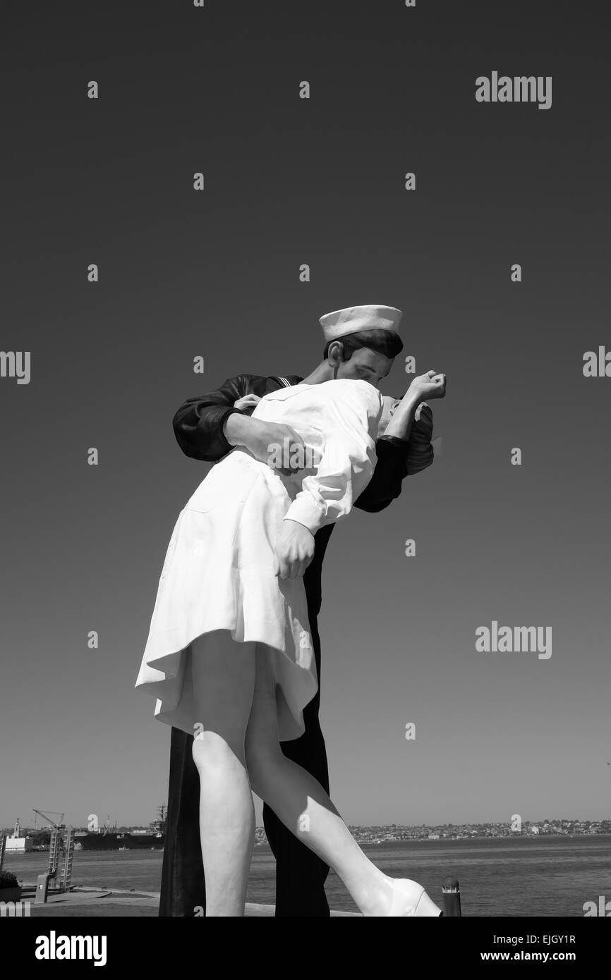 USS Midway on the waterfront in San Diego, and statue of Sailor Kissing