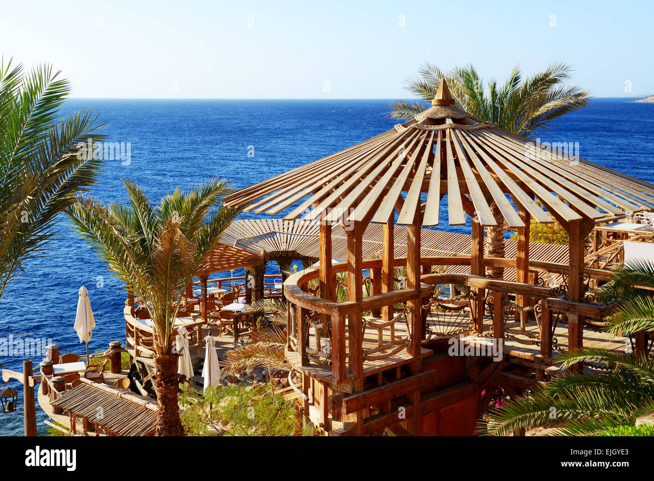 Outdoor restaurant and beach at the luxury hotel, Sharm el Sheikh, Egypt Stock Photo