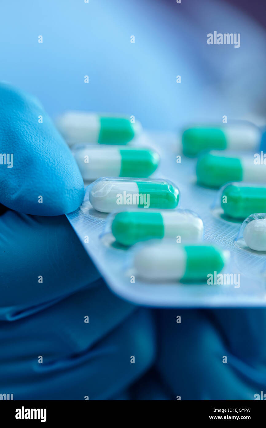 female doctor holding medicine capsules Stock Photo Alamy