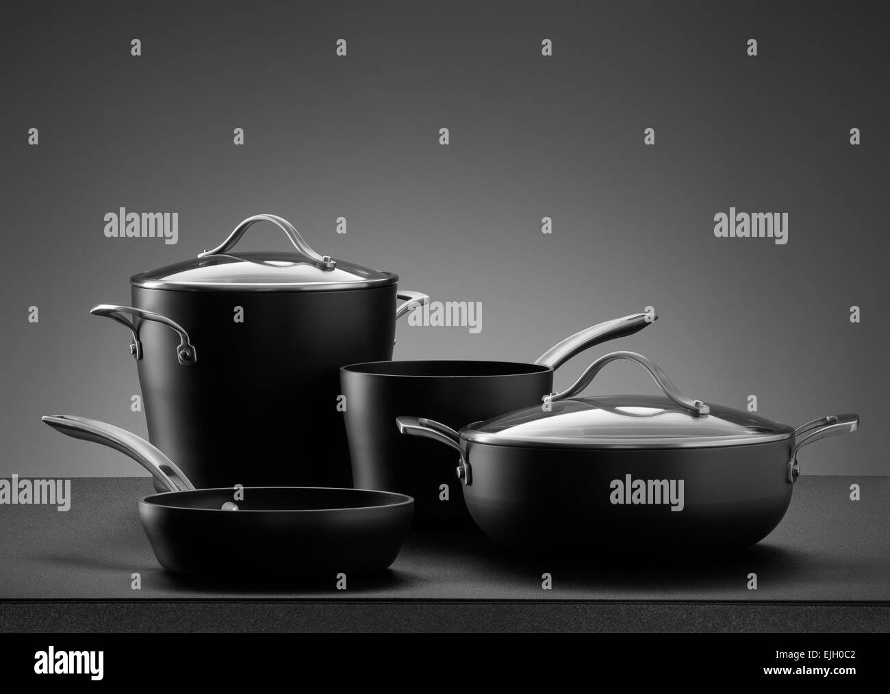 close up view of nice cookware set on grey color back Stock Photo