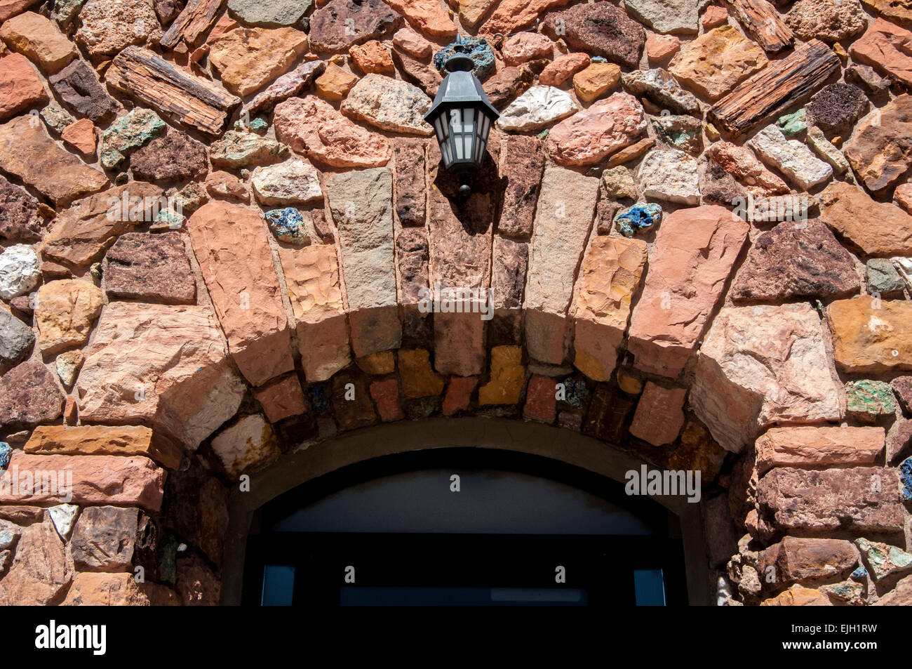 Ornate archway at the entrance of a historic rock masonry Mormon church in Cedar City, Utah. Stock Photo